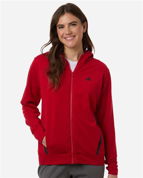 Adidas AT209 Women's Game & Go Fleece Full-Zip Hooded Sweatshirt - Team Power Red/ Black - model front