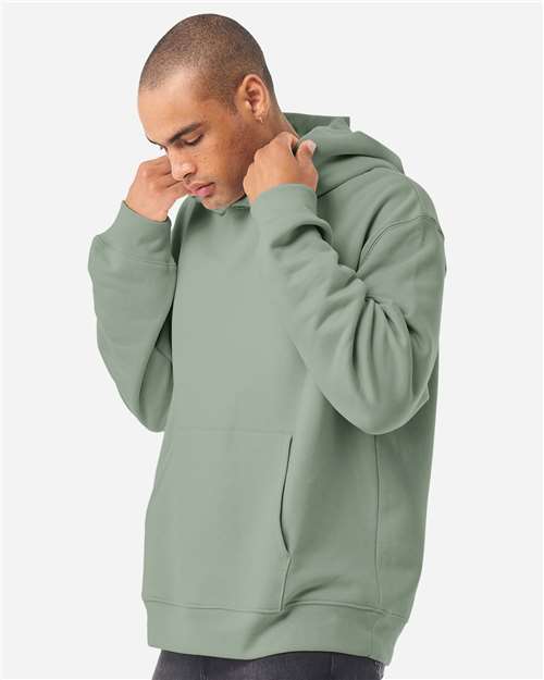 BELLA + CANVAS 4719 Unisex 10 oz. Heavyweight Hoodie Sweatshirt - Sage - model side