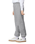Gildan 18200B Youth Heavy Blend Sweatpants - Sport Grey - model side