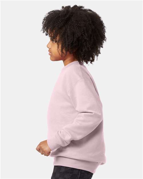 Hanes P360 Youth EcoSmart Crewneck Sweatshirt - Pale Pink - model side