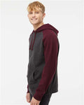 Independent Trading Co. IND40RP Unisex Raglan Hooded Sweatshirt - Charcoal Heather/ Burgundy Heather - model side