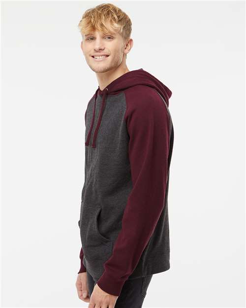 Independent Trading Co. IND40RP Unisex Raglan Hooded Sweatshirt - Charcoal Heather/ Burgundy Heather - model side
