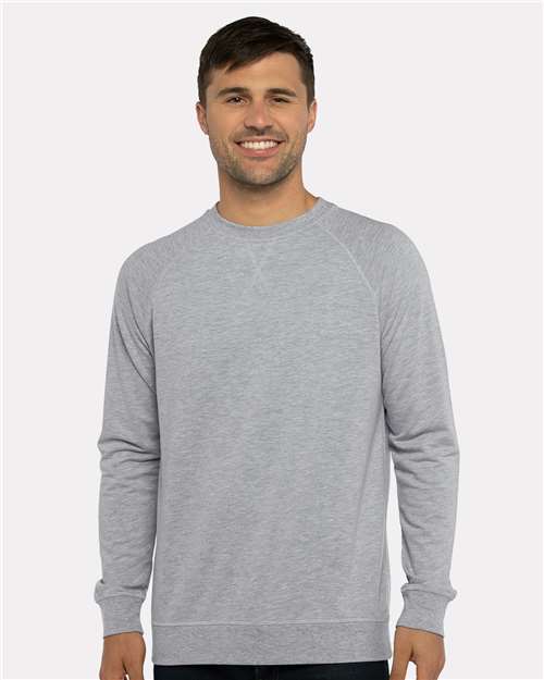 Next Level 9000 Unisex Laguna Raglan Crewneck Sweatshirt - Heather Grey - model front
