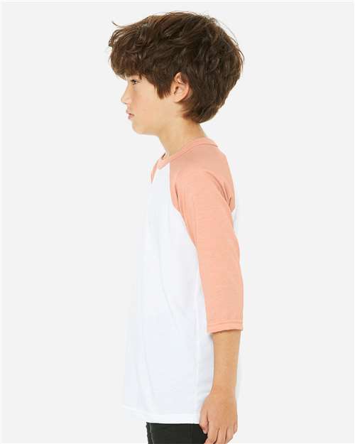 BELLA + CANVAS 3200Y Youth Three-Quarter Sleeve Baseball Tee - White/ Heather Peach - model side