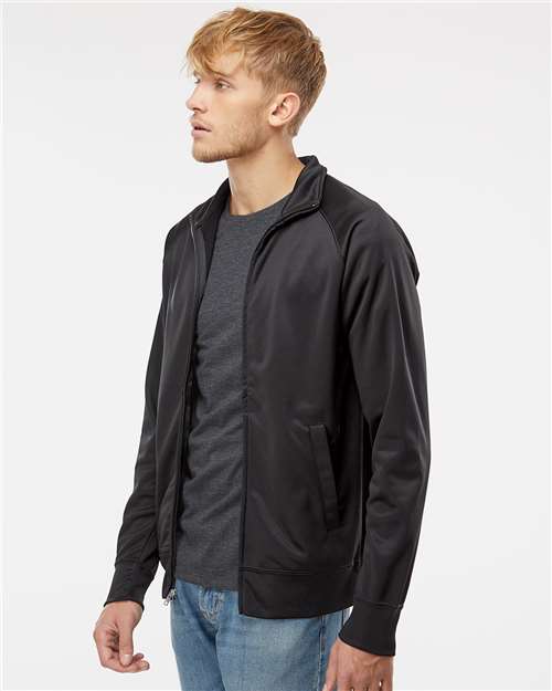 Independent Trading Co. EXP70PTZ Men's Lightweight Poly-Tech Full-Zip Track Jacket - Black/ Black - model side
