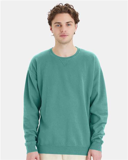 Hanes GDH400 Unisex Garment-Dyed Crewneck Sweatshirt - Spanish Moss - model front