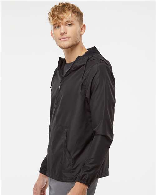Independent Trading Co. EXP54LWP Unisex Lightweight Quarter-Zip Windbreaker Pullover Jacket - Black - model side