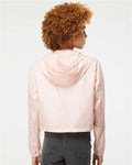 Independent Trading Co. EXP64CRP Women's Lightweight Quarter-Zip Pullover Crop Windbreaker - Blush/ White Zipper - model back