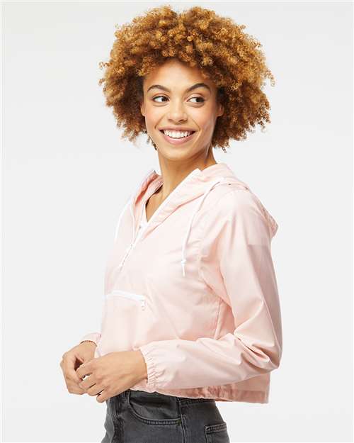 Independent Trading Co. EXP64CRP Women's Lightweight Quarter-Zip Pullover Crop Windbreaker - Blush/ White Zipper - model side