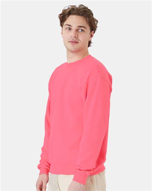 Hanes P160 EcoSmart Crewneck Sweatshirt - Safety Pink - model side