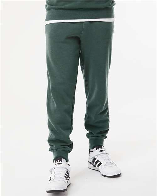 Independent Trading Co. PRM50PTPD Unisex Pigment-Dyed Fleece Sweatpants - Pigment Alpine Green - model front