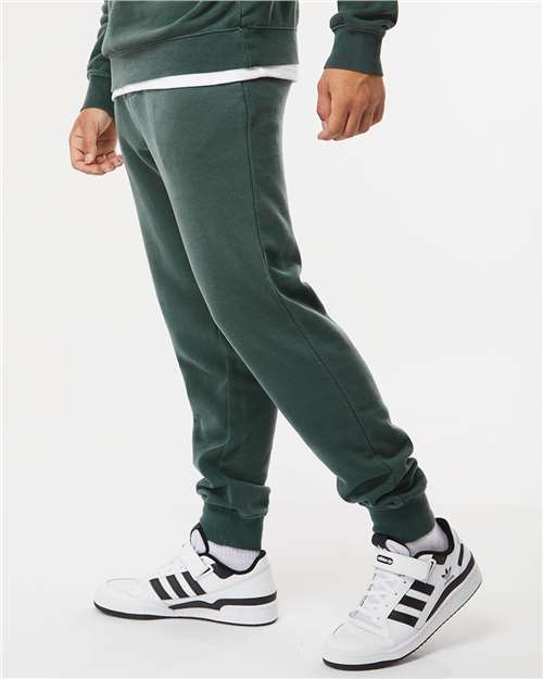 Independent Trading Co. PRM50PTPD Unisex Pigment-Dyed Fleece Sweatpants - Pigment Alpine Green - model side