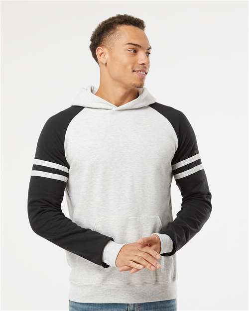 Jerzees 97CR Unisex Nublend Varsity Colorblocked Raglan Hooded Sweatshirt - Oatmeal Heather/ Black Ink - model front