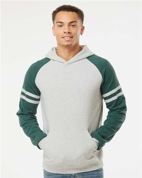 Jerzees 97CR Unisex Nublend Varsity Colorblocked Raglan Hooded Sweatshirt - Oatmeal Heather/ Forest Green Heather - model front