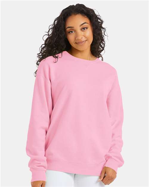 Hanes GDH400 Unisex Garment-Dyed Crewneck Sweatshirt - Cotton Candy - model front