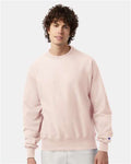 Champion S149 Unisex Reverse Weave Crewneck Sweatshirt - Body Blush - model front