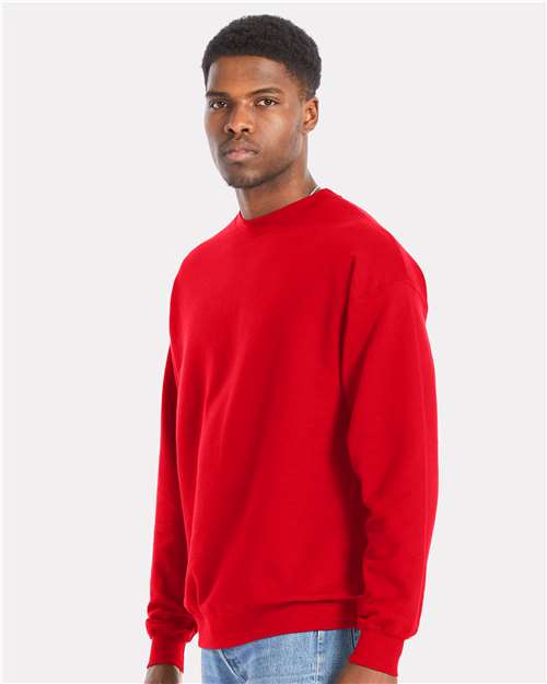 Hanes RS160 Unisex Perfect Sweats Crewneck Sweatshirt - Athletic Red - model side