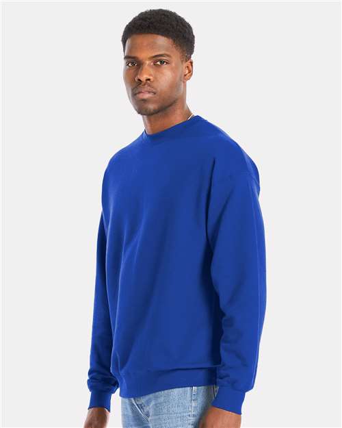 Hanes RS160 Unisex Perfect Sweats Crewneck Sweatshirt - Deep Royal - model side