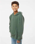 Independent Trading Co. PRM1500Y Youth Midweight Pigment-Dyed Hooded Sweatshirt - Pigment Alpine Green - model side