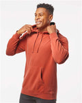 Independent Trading Co. PRM4500 Unisex Midweight Pigment-Dyed Hooded Sweatshirt - Pigment Amber - model side
