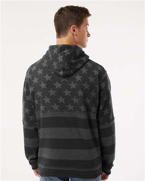J. America 8815 Men's Tailgate Hooded Sweatshirt - Black Stars & Stripes - model back